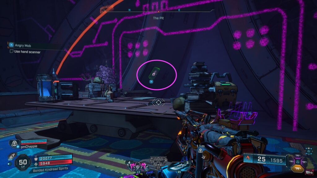 press the handprint behind the desk to reveal the back room